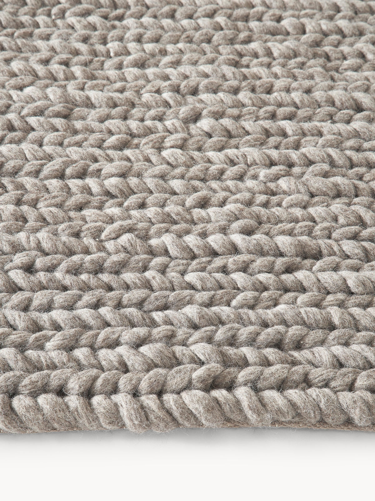 Brunora Handmade Rug in Wool with Braided Texture