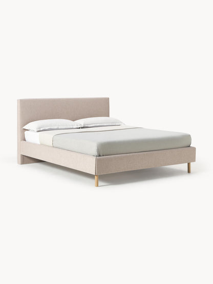 Giurenza Upholstered Bed with Wooden Feet