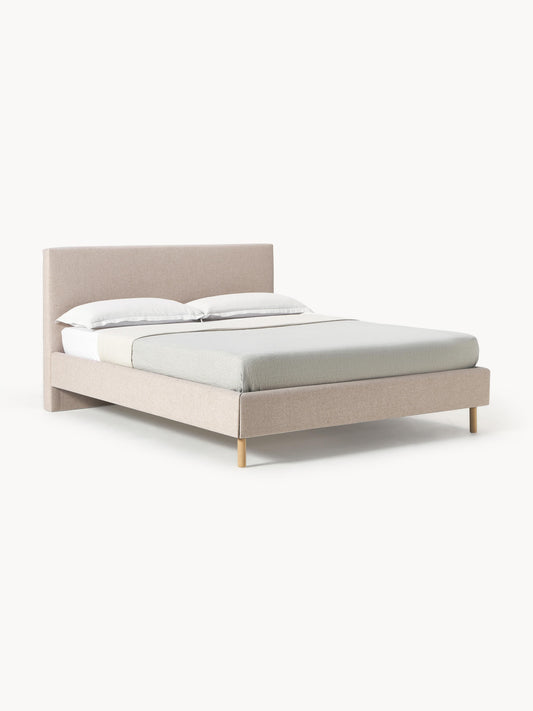 Giurenza Upholstered Bed with Wooden Feet