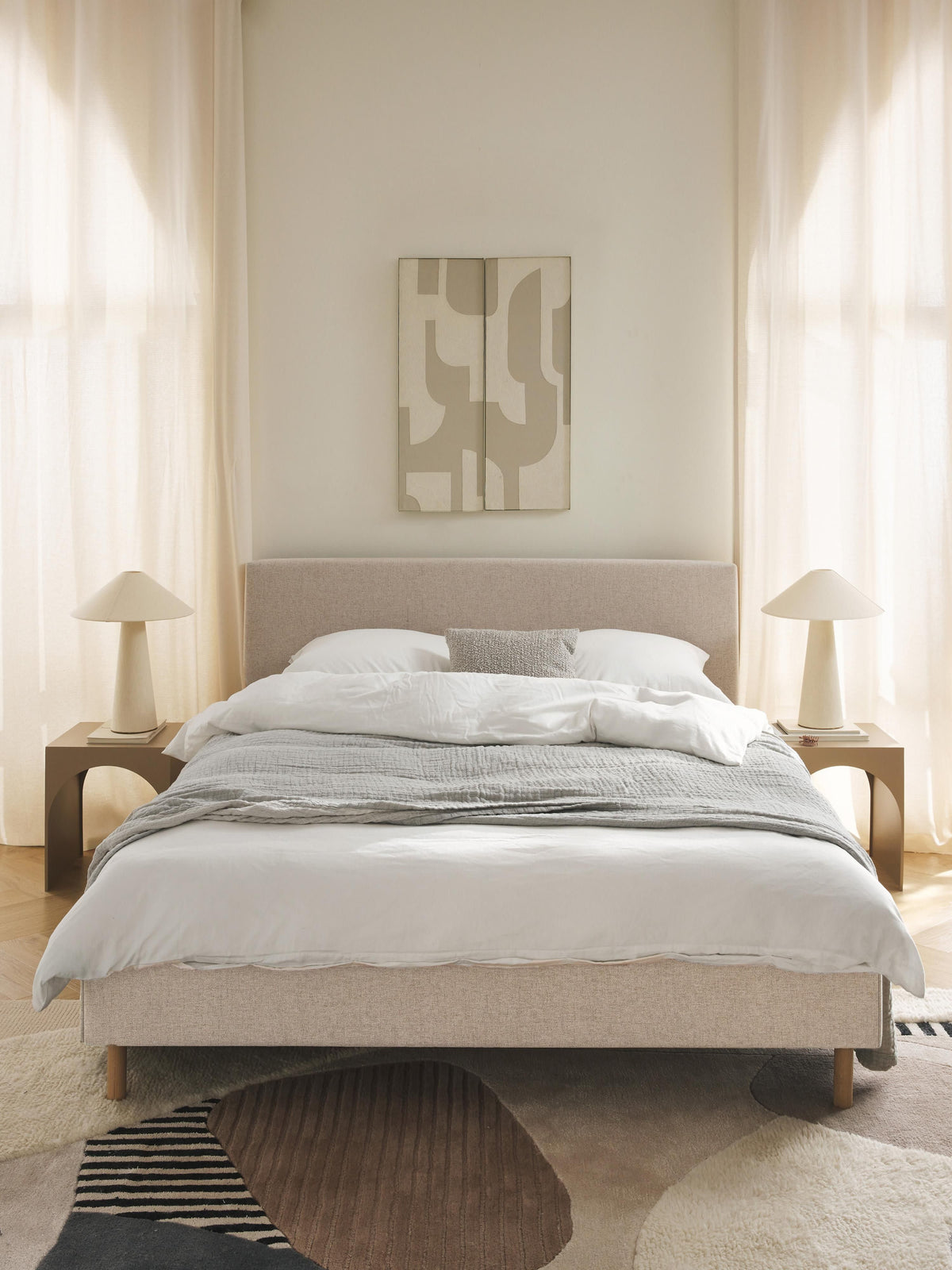 Giurenza Upholstered Bed with Wooden Feet